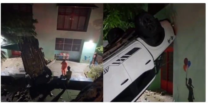 Carro bate e cai dentro de escola em BH